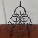 Vintage metalen wijnrek met gedraaide vormen